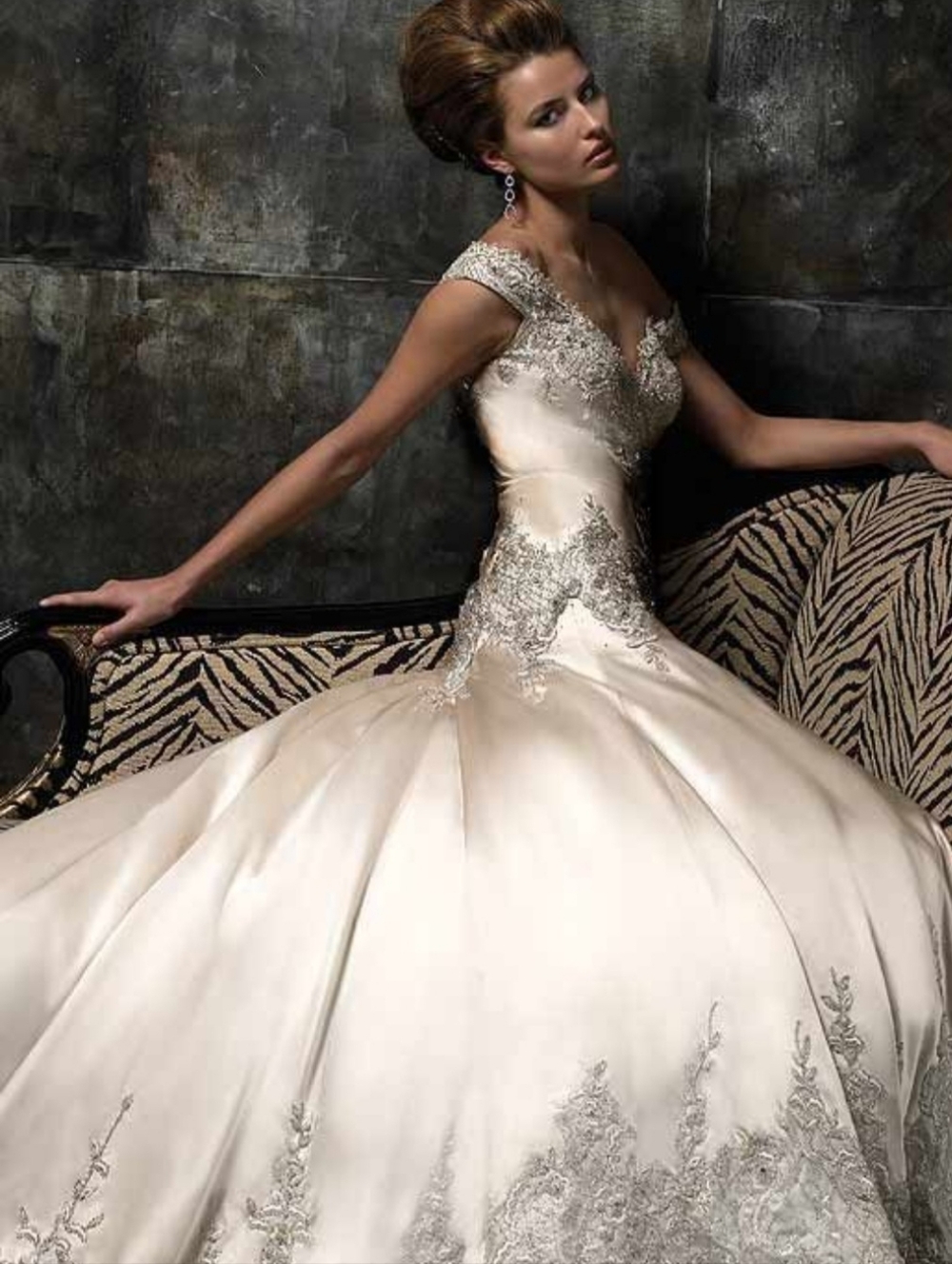 This Stephen Yearick wedding gown features a champagne silky satin, fit & flare.